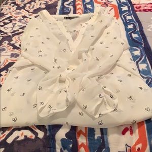 Off white, sheer tunic with doves on it